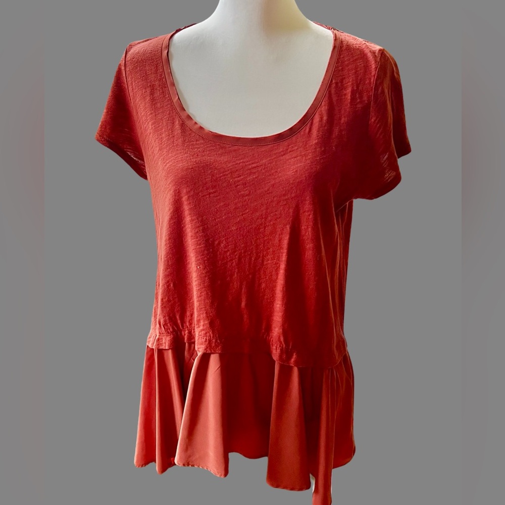 Free People style rusty-red T-shirt top with flounce extensions